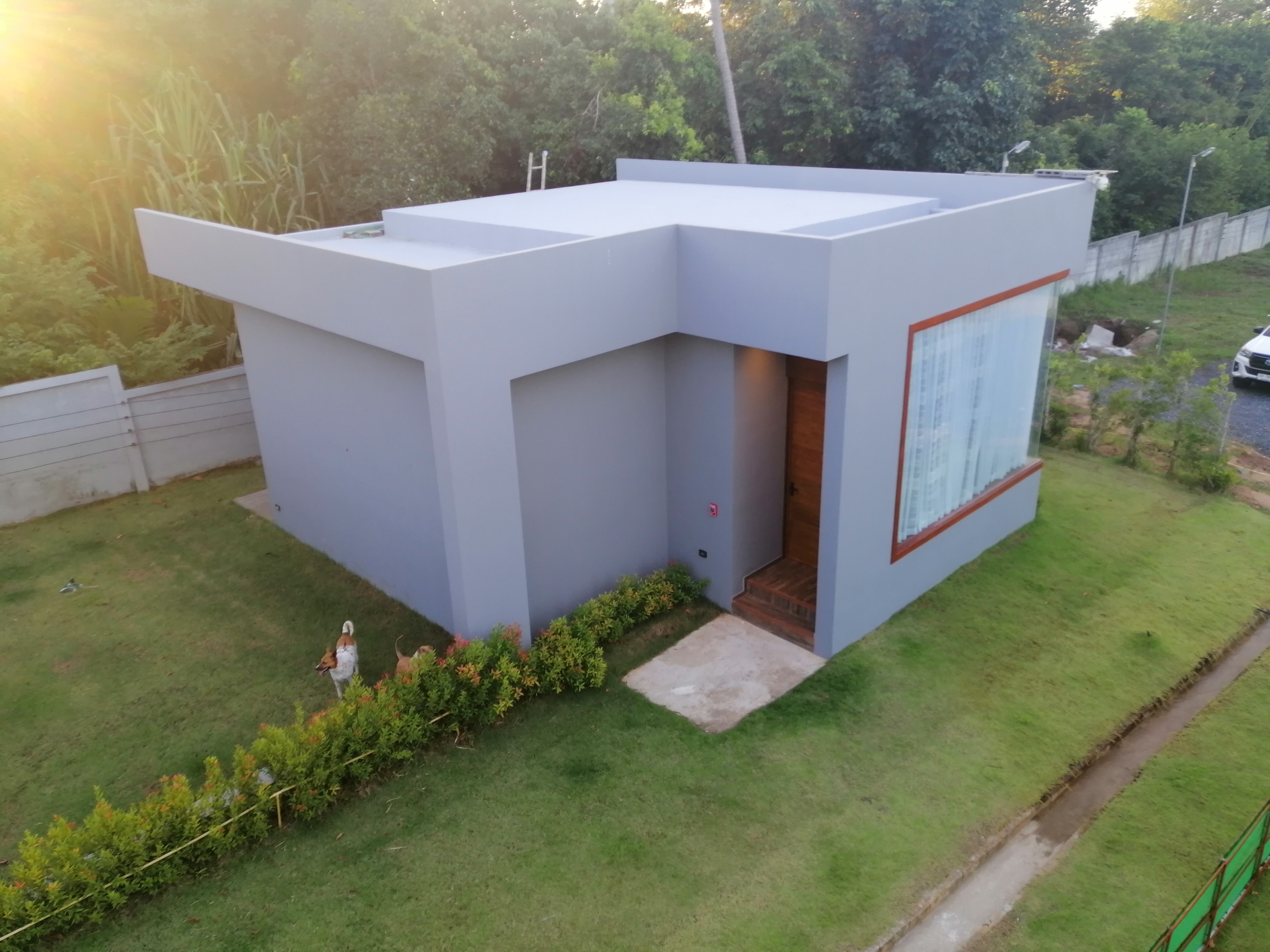 1-Bedroom Villa — aerial view, sunset, green yard